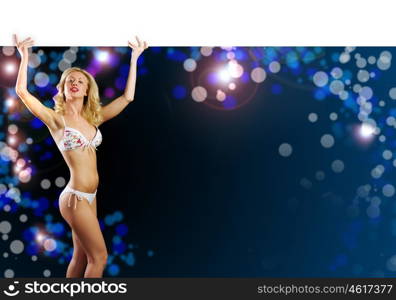 Girl holding banner. Young girl in white bikini with blank banner. Place for text