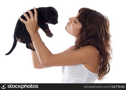 Girl holding dog over a white background