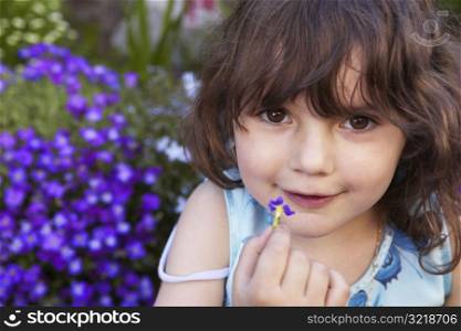 Girl Holding Flower