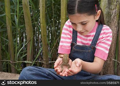 Girl Holding Frog