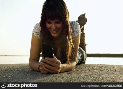 Girl holding mobile phone