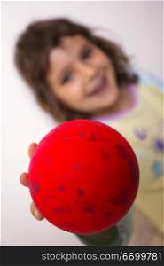 Girl Holding Red Ball