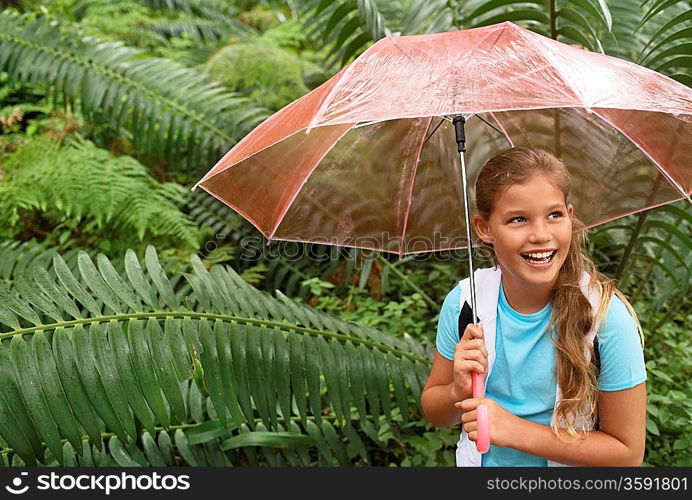 Girl Holding Umbrella in Forest