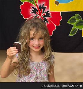 Girl Holding Up Ice Cream Bar at Moorea in Tahiti