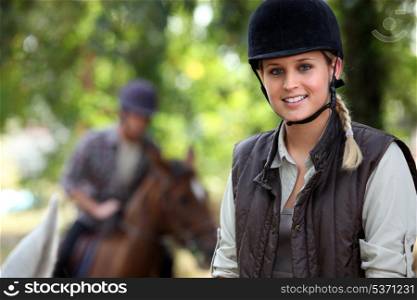 Girl horse riding