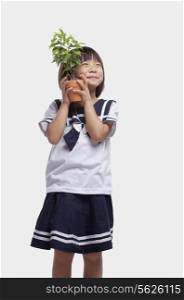 Girl Hugging Potted Plant