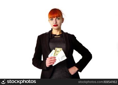 girl in a business dark dress takes a bribe or receives a salary in a paper envelope