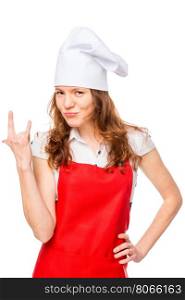 girl in a cap and apron showing hand gesture on a white background