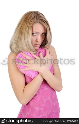 girl in a pink dress embracing a heart with his hands. Isolated on white background