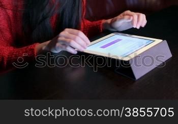 girl in a restaurant with a tablet