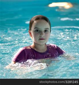 Girl in a swimming pool at Gimli, Manitoba, Canada