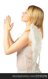 girl in angel&acute;s costume prays