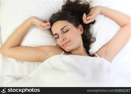 Girl in bed waking up