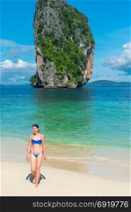 girl in bikini on the beach of the island of Poda, Thailand