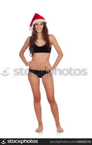 Girl in black underwear and a Santa hat isolated on a white background