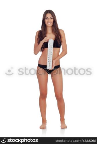 Girl in black underwear with a thermometer isolated on a white background