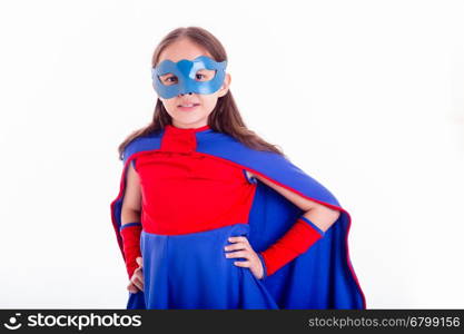 Girl in blue and red superhero costume with hands on hips