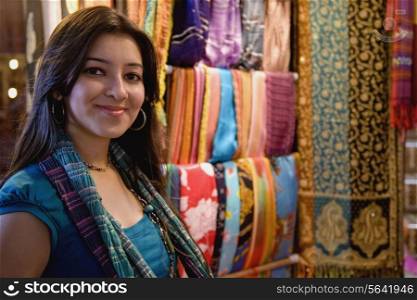 Girl in front of a garment shop