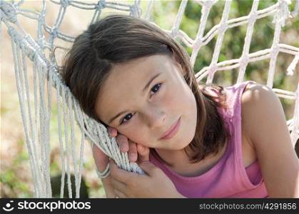 Girl in hammock, portrait