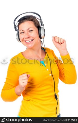 girl in headphones listens to music and dances