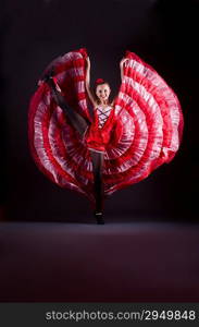 Girl in red dress dancing dance