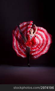 Girl in red dress dancing dance