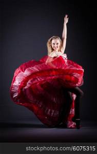 Girl in red dress dancing dance