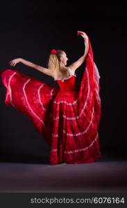 Girl in red dress dancing dance