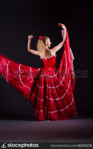 Girl in red dress dancing dance