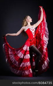 Girl in red dress dancing dance