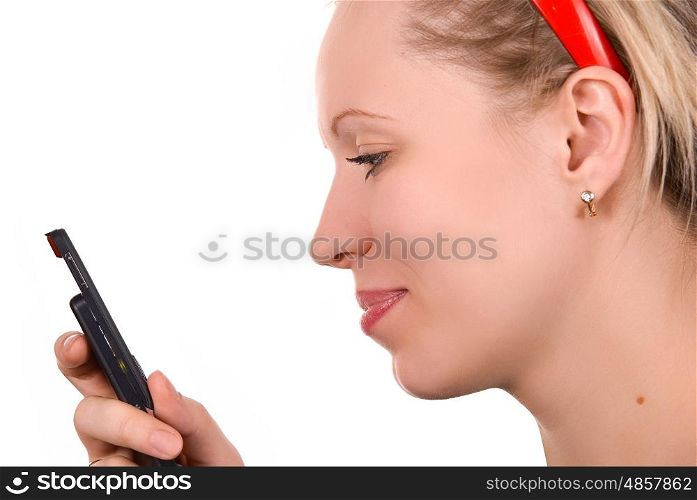 Girl in red hair band with mobile phone on white