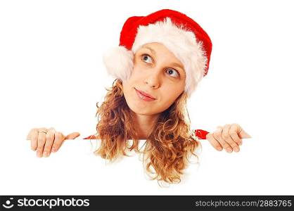 Girl in Santa&acute;s hat with a signboard, isolated on white