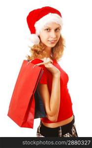 Girl in Santa&acute;s hat with bags, isolated on white