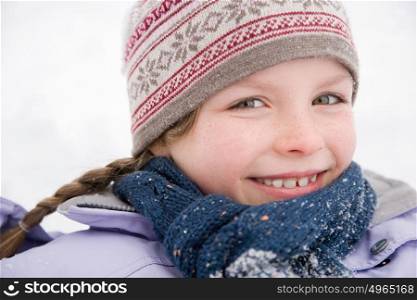 Girl in scarf and hat