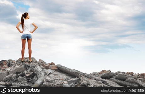 Girl in shorts. Rear view of young girl in denim shorts