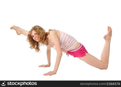 Girl in sportswear makes gymnastic