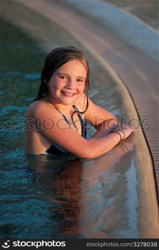 Girl in swimming pool in Kenya