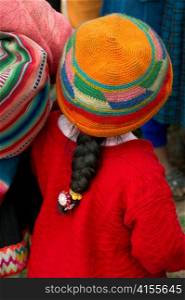 Girl in the schoolyard of Chumpepoke Primary School, Sacred Valley, Cusco Region, Peru