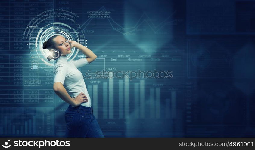 Girl in virtual designed room. Young woman wearing headphones on virtual blue interface