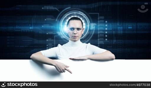 Girl in virtual designed room. Young woman with white banner on virtual blue interface