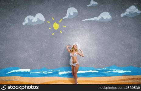 Girl in white bikini. Young hot woman in hat and bikini on colorful background