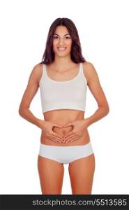Girl in white underwear forming a heart with her hands on her belly isolated