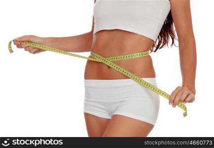 Girl in white underwear with a tape measure around her waist isolated