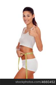 Girl in white underwear with a tape measure around her waist saying Ok isolated