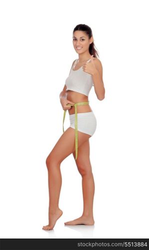 Girl in white underwear with tape measure saying Ok isolated