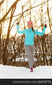 Girl jogging in freezing temperature. How to prepare for exercising in winter, fitness health nature fashion concept. Girl jogging in freezing temperature