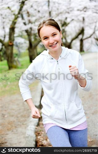 Girl jogging in park