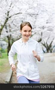 Girl jogging in park