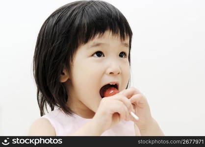 Girl licking the candy