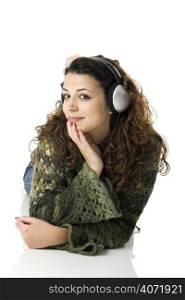 Girl listening to music through headphones